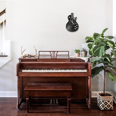KingLive guitar clock hanging on living room wall adds musical decor vibe