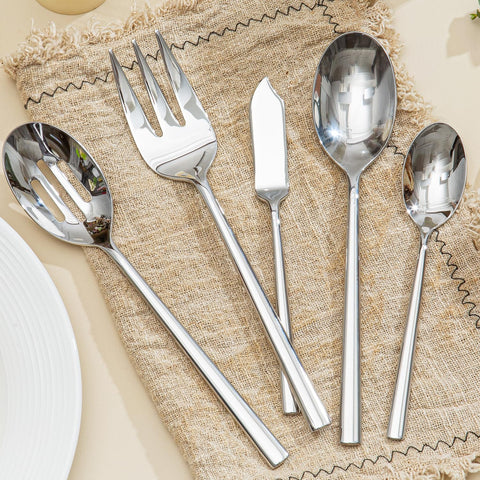 KINGSTONE dinner fork and spoon paired on plate showing comfortable grip and refined appearance