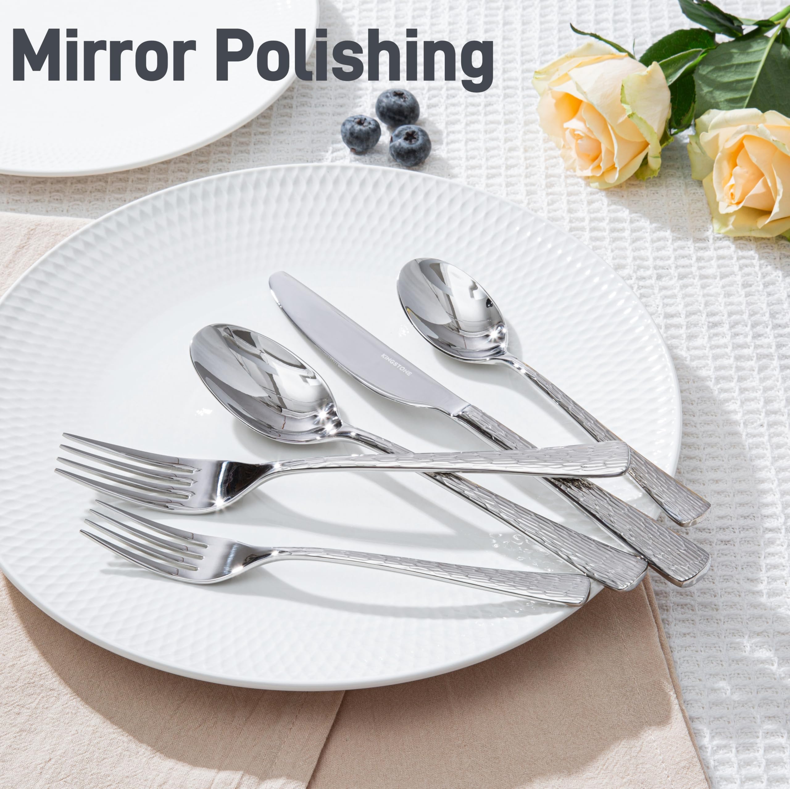 KINGSTONE forks and knives held to show ergonomic balance and sturdy feel