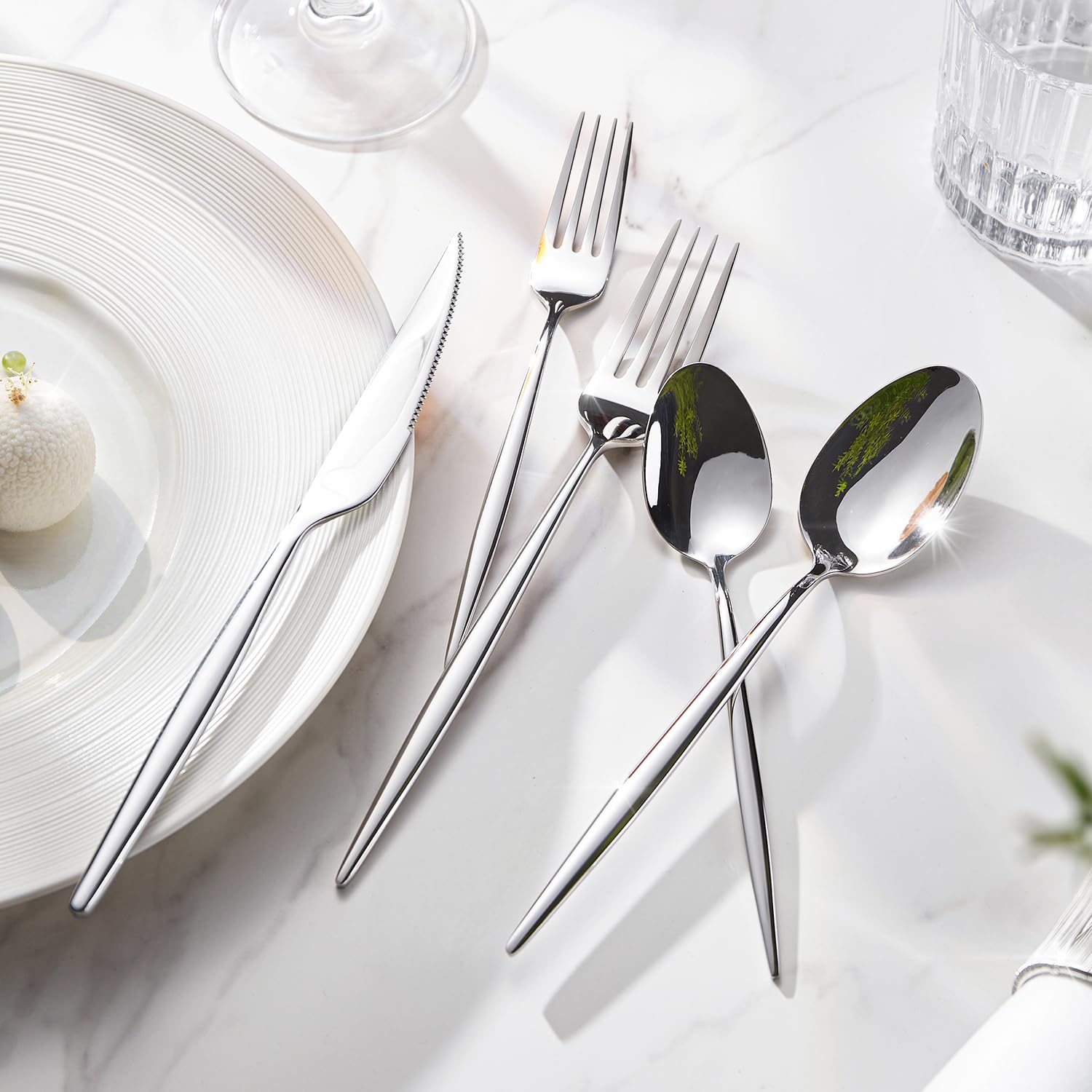 KINGSTONE full 20-piece flatware set arranged on a dining table enhancing presentation