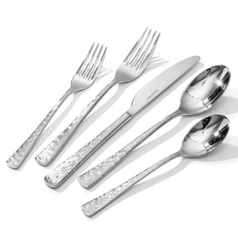 KINGSTONE lifestyle dinner party shot with guests using the flatware to show suitability for entertaining benefit