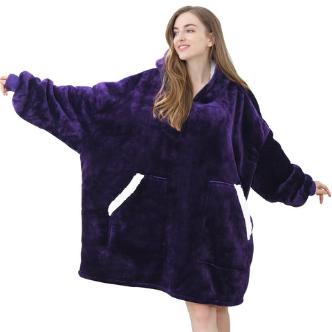 Kipswiza wearable blanket folded in travel bag for portable warmth