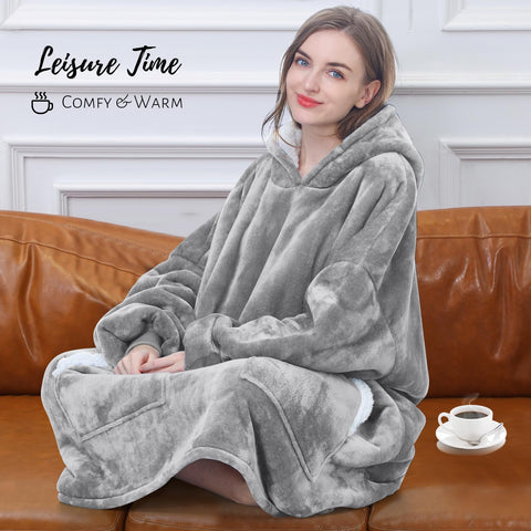 Kipswiza blanket hoodie used at a campfire offering travel warmth