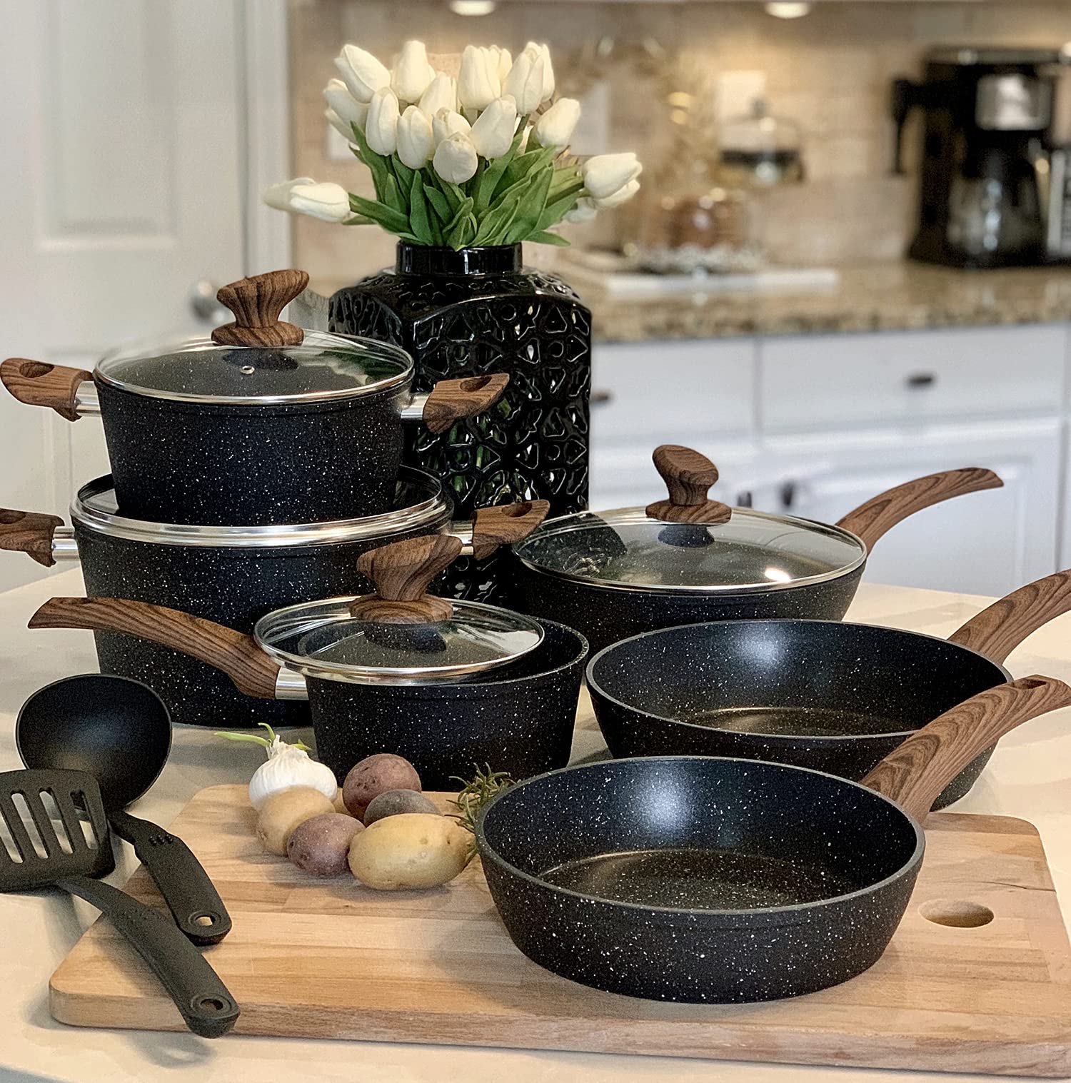 Kitchen Academy front packaging showing the 12-piece cookware set and included utensils, highlighting value