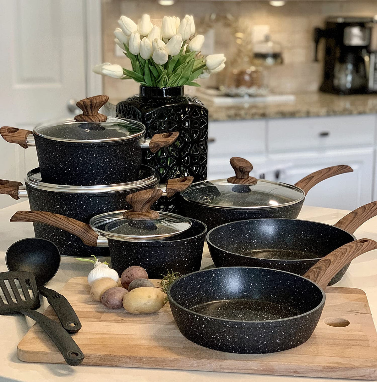 Kitchen Academy front packaging showing the 12-piece cookware set and included utensils, highlighting value