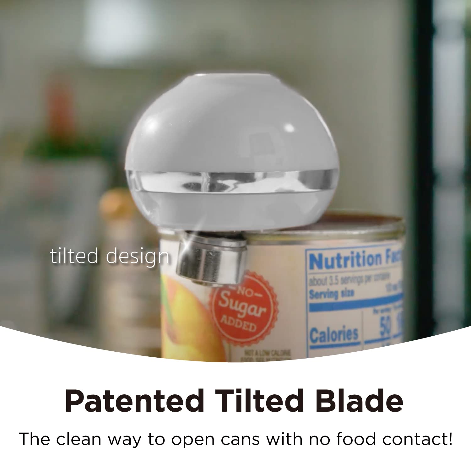 Kitchen Mama Mini next to a hand for scale, Kitchen Mama compact size ideal for small spaces