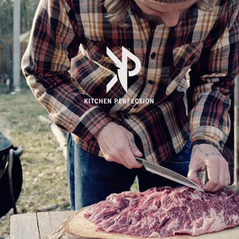 Kitchen Perfection cleaver in canvas sheath for safe storage and easy transport