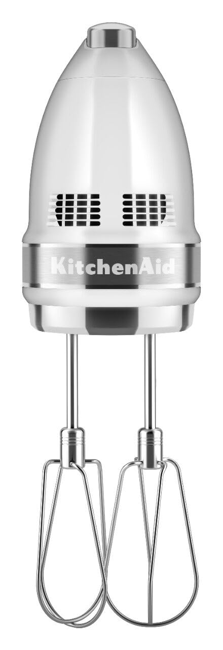 KitchenAid accessories laid out with whisk, dough hooks, blending rod, organized storage