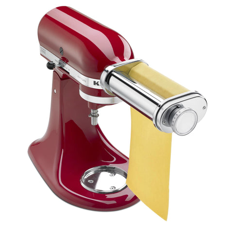 KitchenAid attachment mounted on mixer in use producing uniform pasta sheets