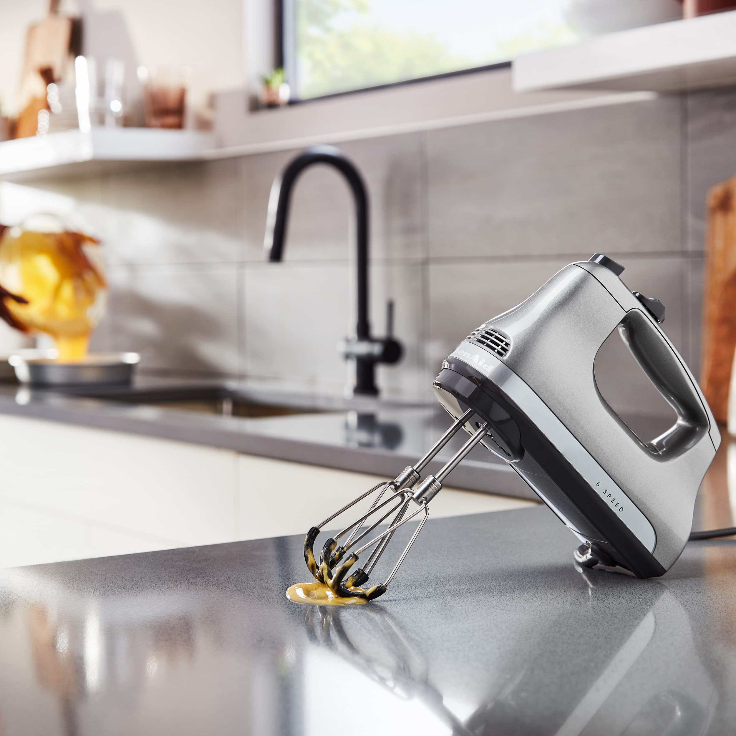KitchenAid beaters mixing batter in bowl showing smoother incorporation and fewer lumps