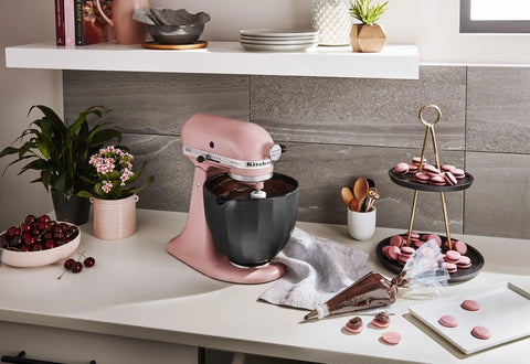KitchenAid bowl seated in tilt-head mixer demonstrating secure fit and hands-free mixing benefit