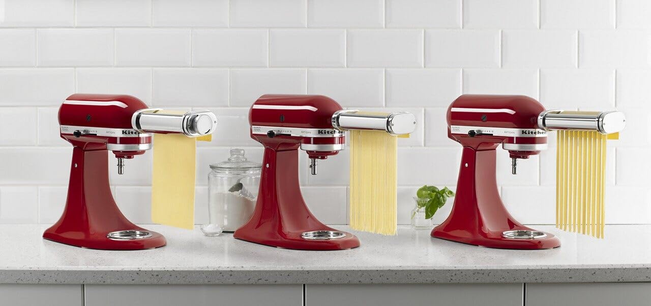 KitchenAid cleaning brush beside attachments for easy maintenance