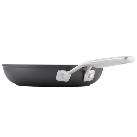 KitchenAid pan being loaded into dishwasher showing dishwasher-safe convenience for cleanup