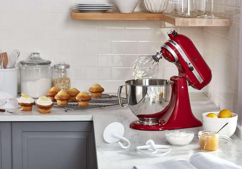 KitchenAid flat beater attached in tilt-head mixer demonstrating efficient batter mixing