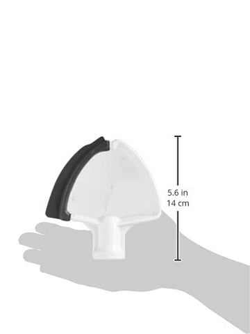 KitchenAid beater beside measuring cup for scale showing compact 3.5‑quart compatibility