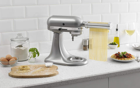 KitchenAid fresh pasta plated in a kitchen scene emphasizing homemade quality