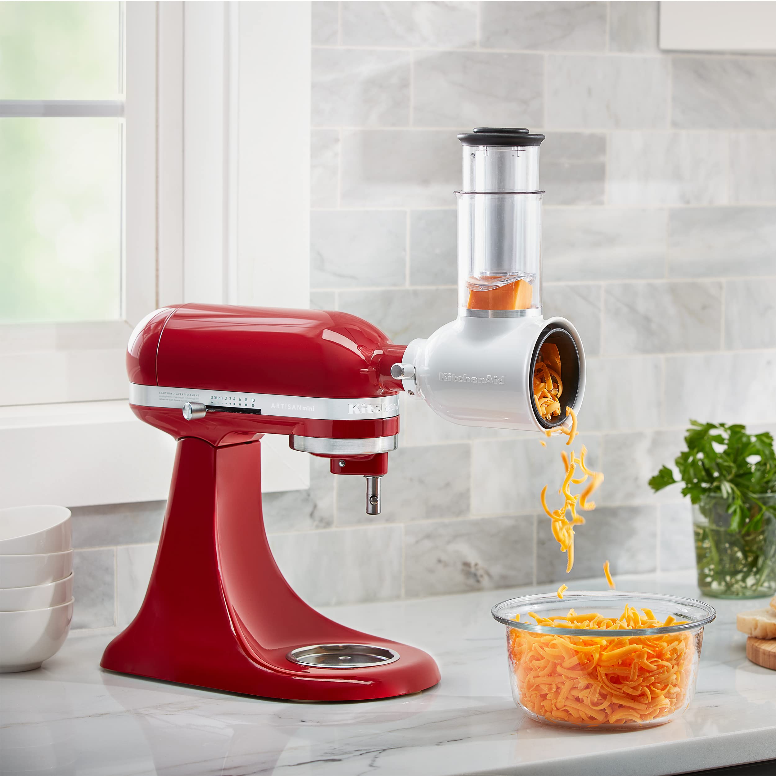 KitchenAid product packaging and manual showing included components and easy setup benefit