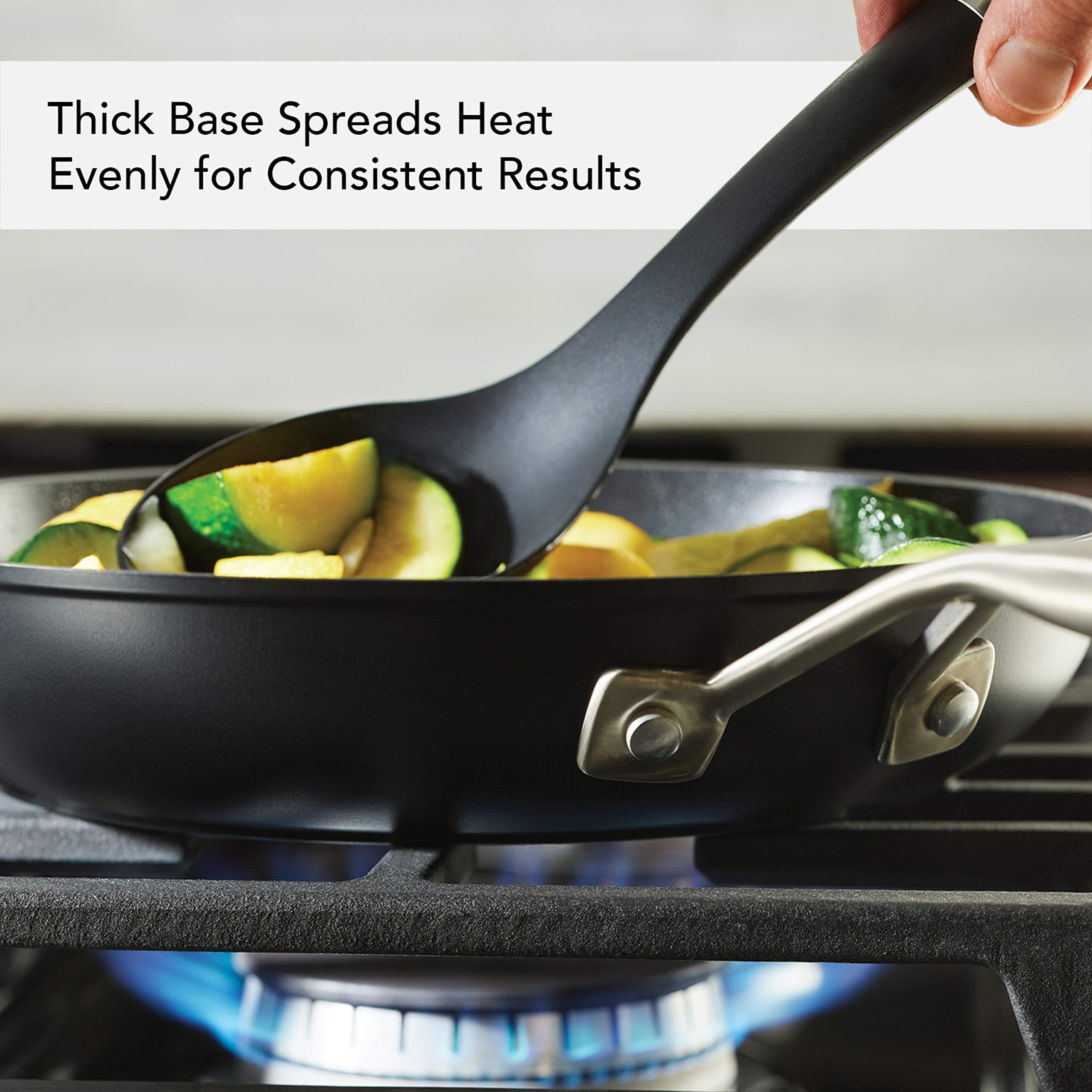 KitchenAid pan thick forged base underside highlighting even heat distribution benefit