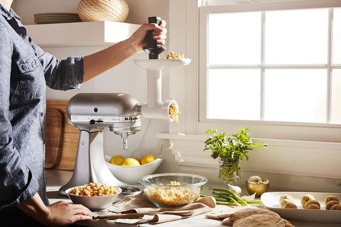 KitchenAid grinder beside sausage stuffer showing compatibility and versatility benefit