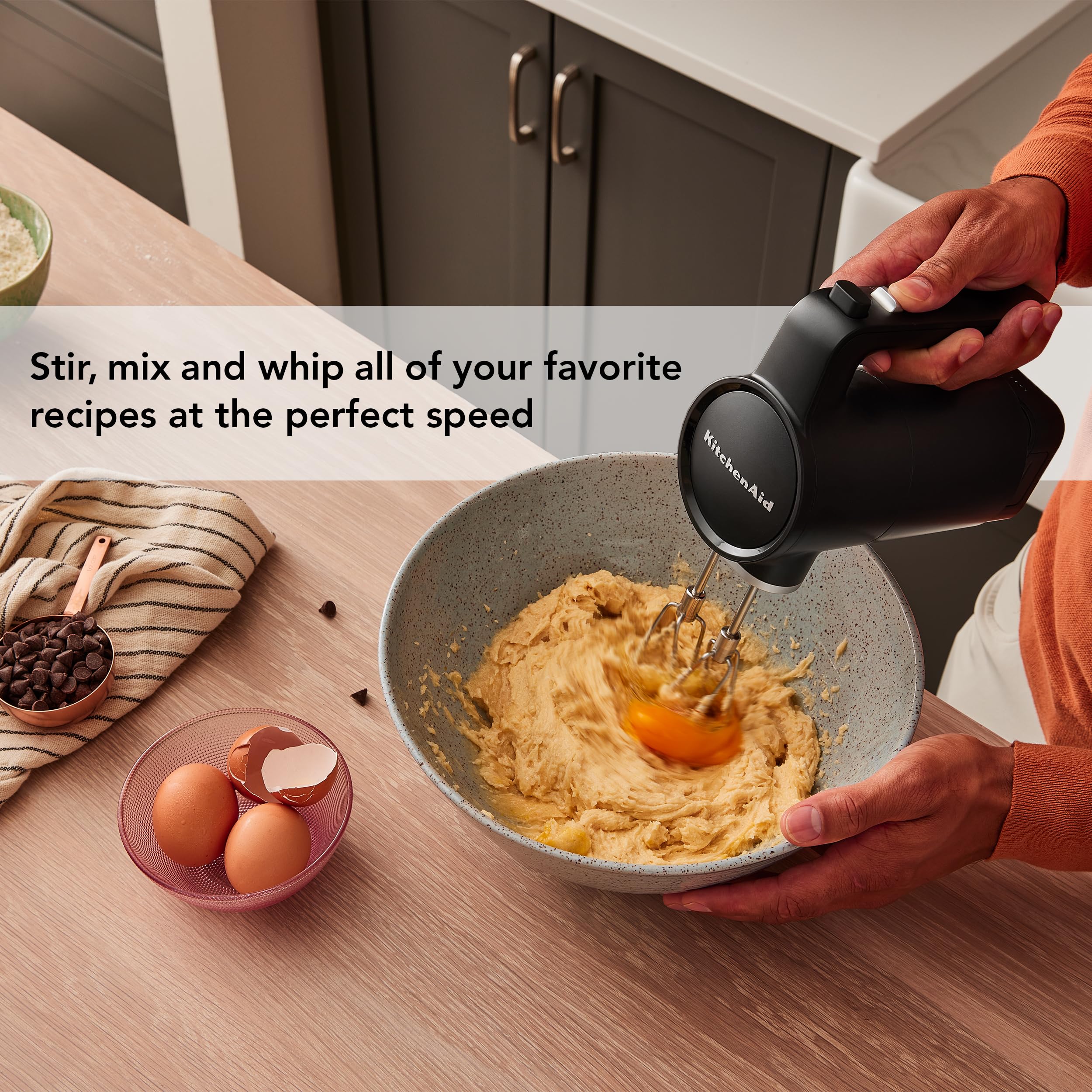 KitchenAid KHMR700 next to 12v battery showing scale and removable battery convenience