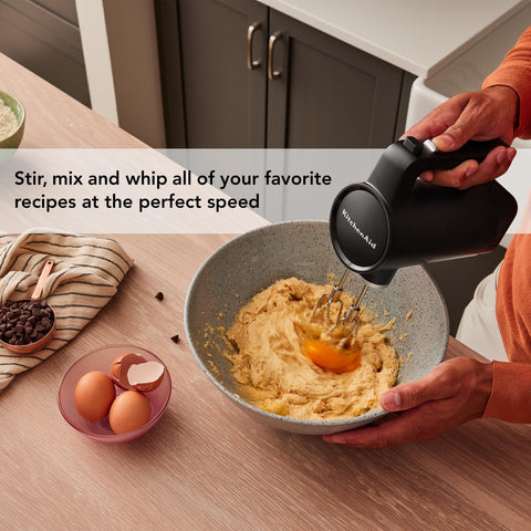 KitchenAid KHMR700 next to 12v battery showing scale and removable battery convenience