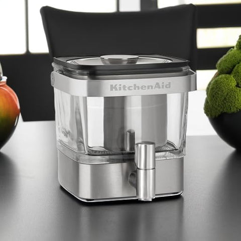 KitchenAid cold brewer on refrigerator shelf fits compact spaces