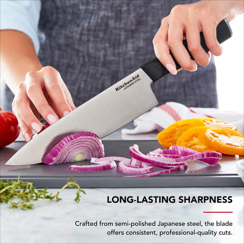 KitchenAid chef knife slicing vegetables for precise, effortless cuts