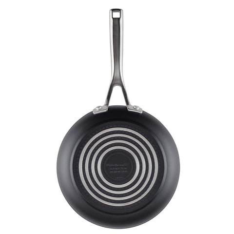 KitchenAid pan cooking eggs in a cozy kitchen scene emphasizing quick breakfasts and everyday use