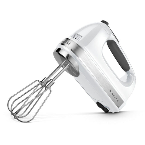 KitchenAid hand mixer in a bowl blending batter, fast results for home baking