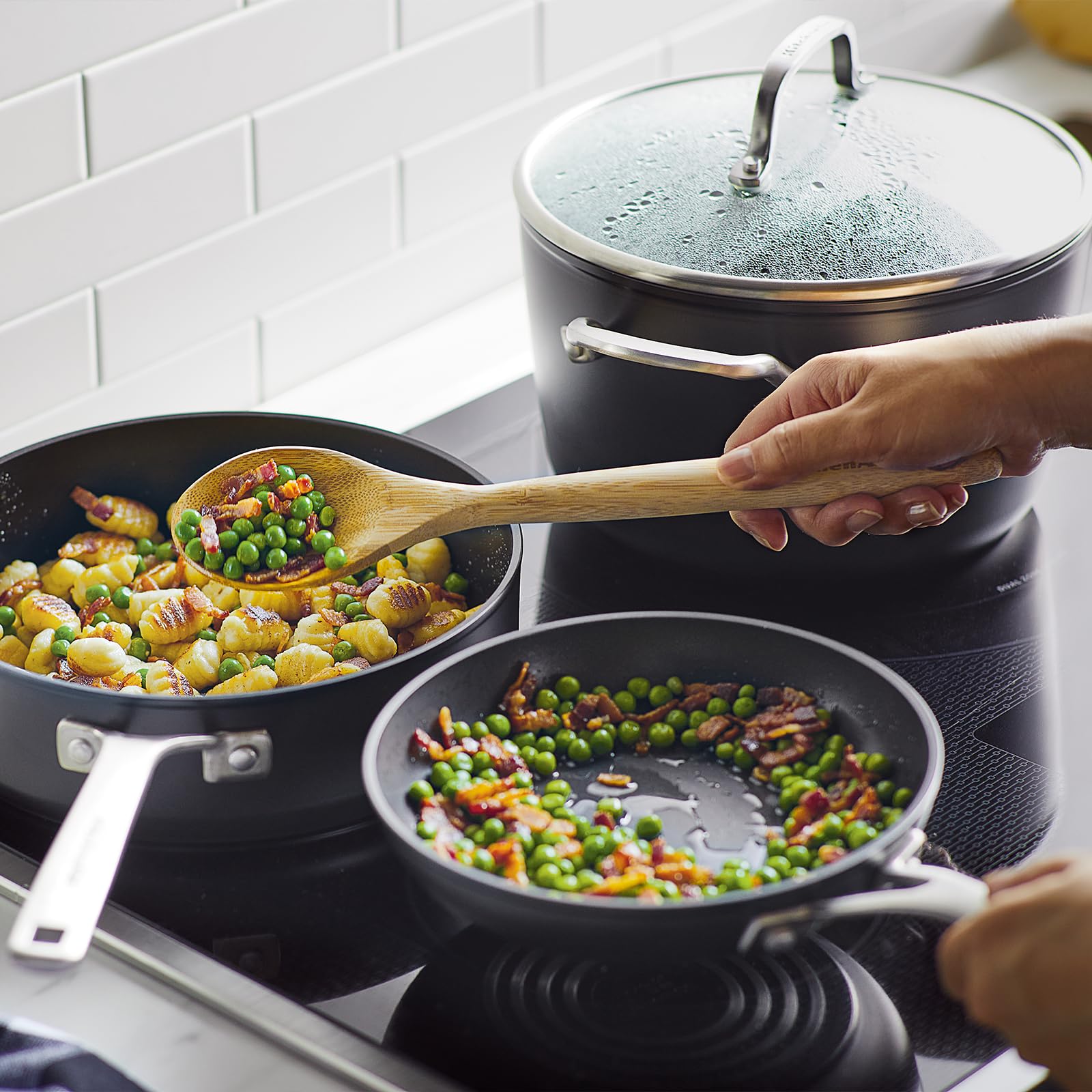 KitchenAid nested pans layout showing compact storage and space-saving advantage