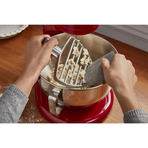 KitchenAid pastry beater mounted in stainless steel bowl demonstrating efficient bowl-lift operation and even mixing