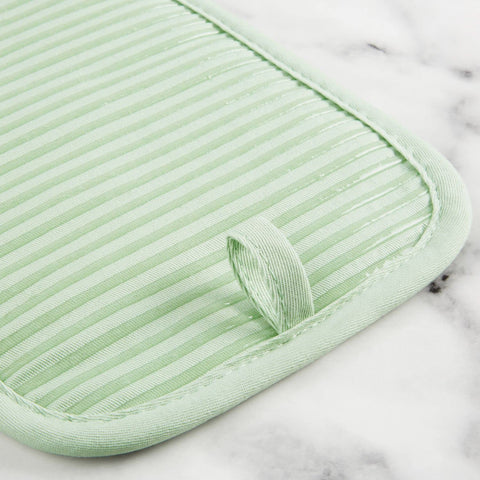 KitchenAid pot holder used as trivet protecting countertop from hot cookware