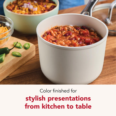 KitchenAid pouring from saucepan demonstrating pour-spout control and mess reduction