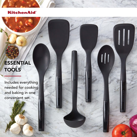 KitchenAid short turner beside spoon for scale and compact utility