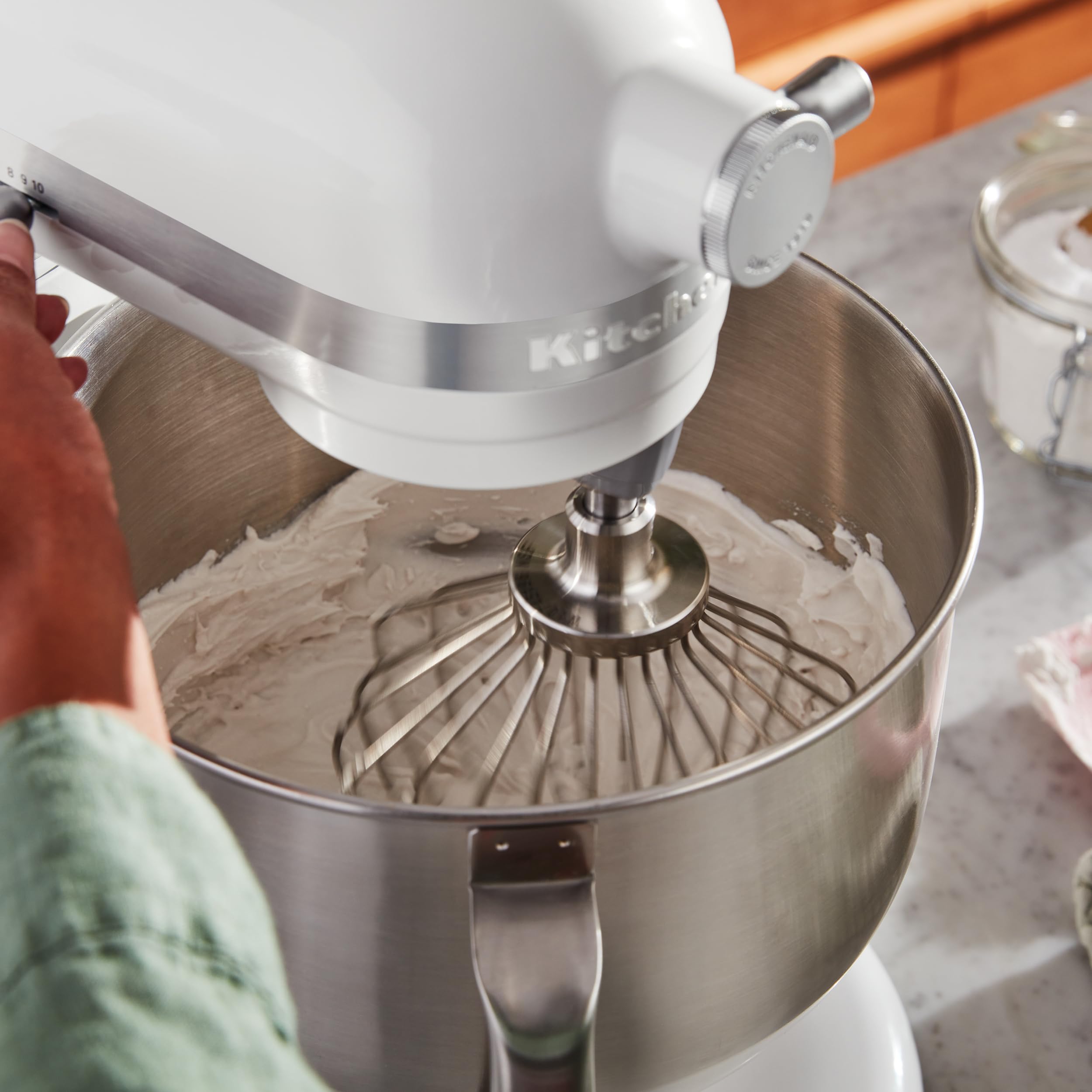 KitchenAid attachments beside a mixer showing correct size and compatibility