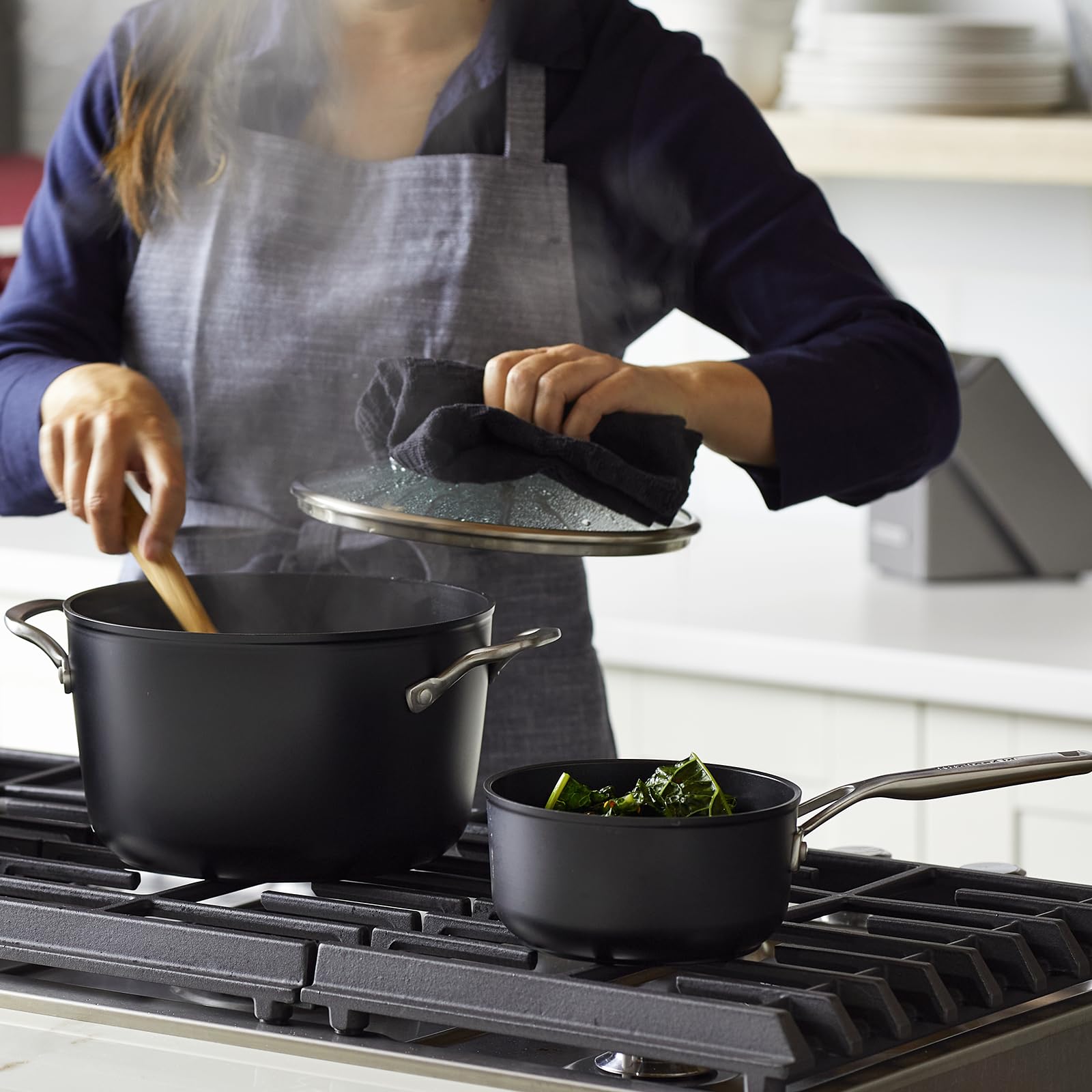 KitchenAid cookware next to measuring cup for clear size and scale reference