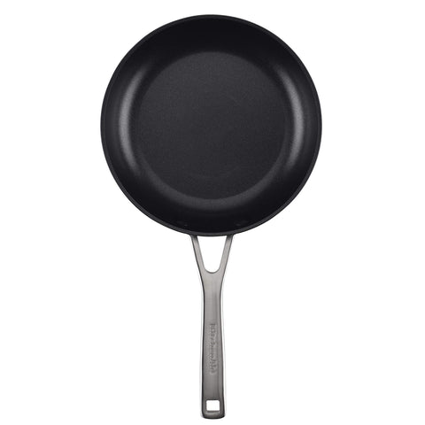 KitchenAid pan beside spatula for scale and portability, ideal for small-portion cooking