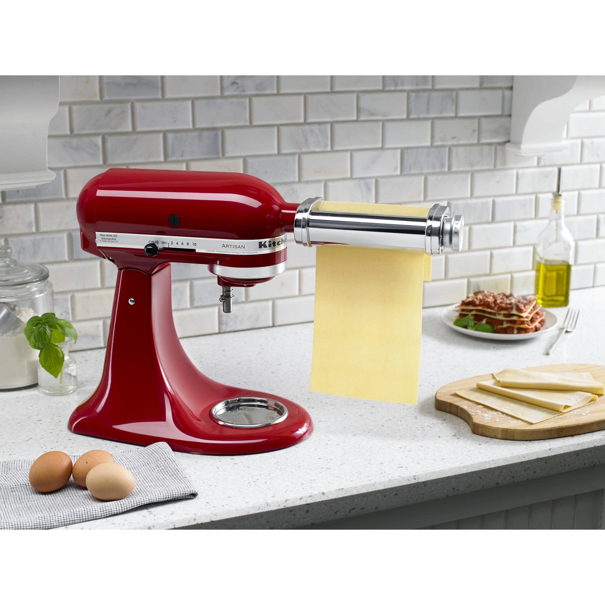 KitchenAid attachment size shown next to hand to show compact storage and fit