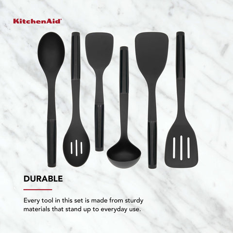KitchenAid slotted turner lifting food while draining excess liquid
