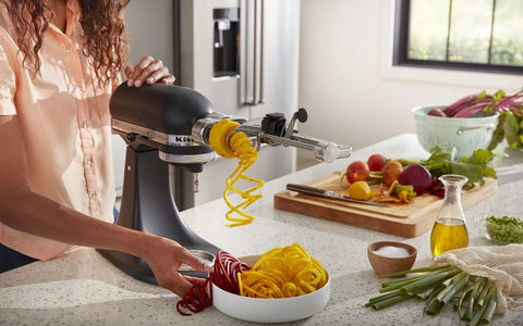 KitchenAid close-up of peeling blade highlighting efficient skin removal for prep