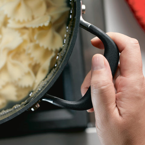 KitchenAid glass lid with visible steam venting to show controlled simmering and flavor retention