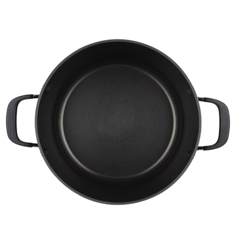 KitchenAid stock pot beside measuring cup to show scale and portioning advantage