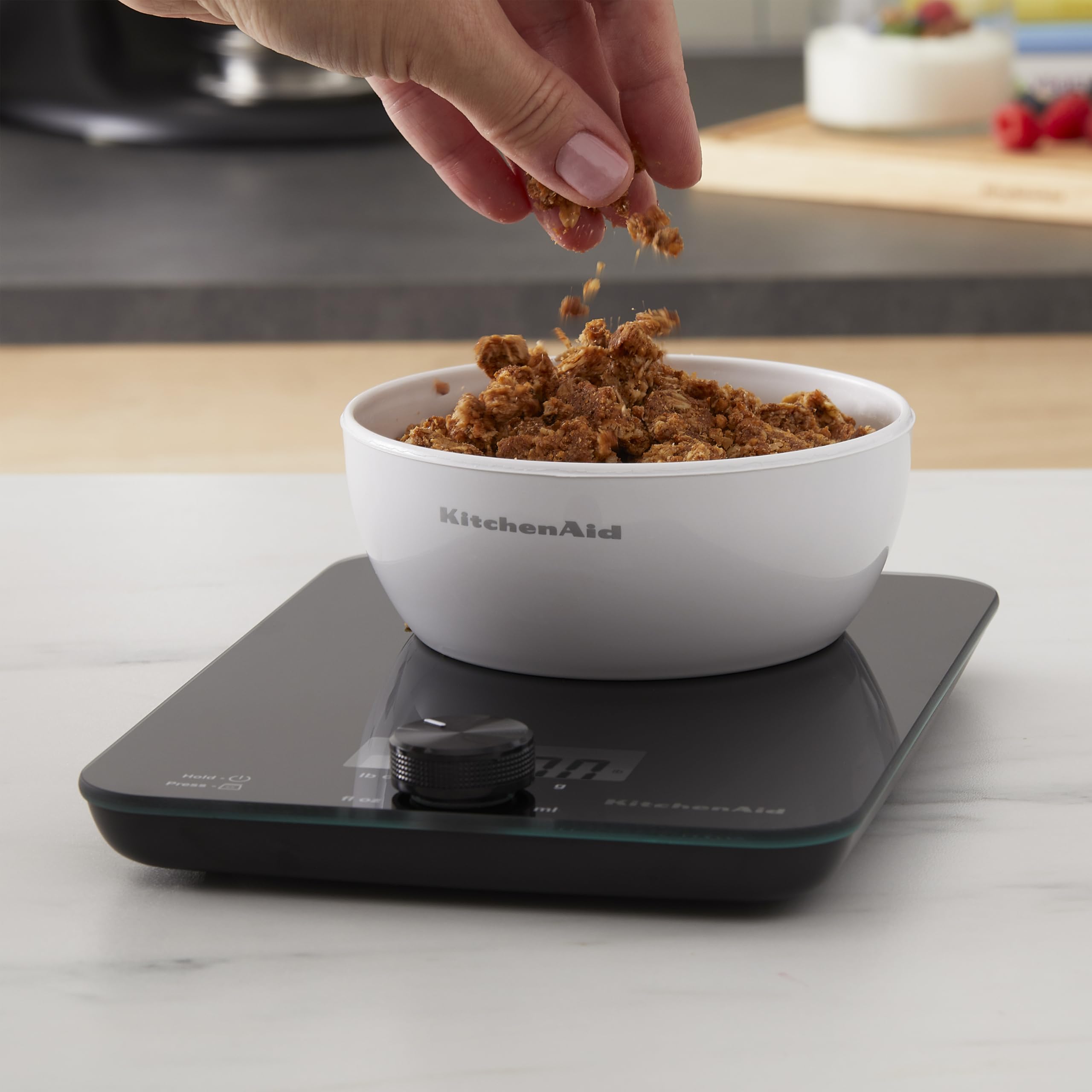 KitchenAid tempered glass surface detail shows stain-resistant finish for easy cleaning
