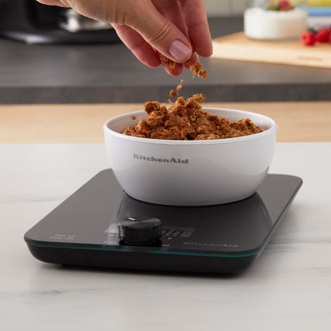 KitchenAid tempered glass surface detail shows stain-resistant finish for easy cleaning