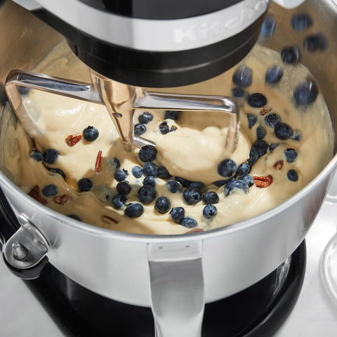 KitchenAid wire whip in use whipping cream quickly for lighter texture