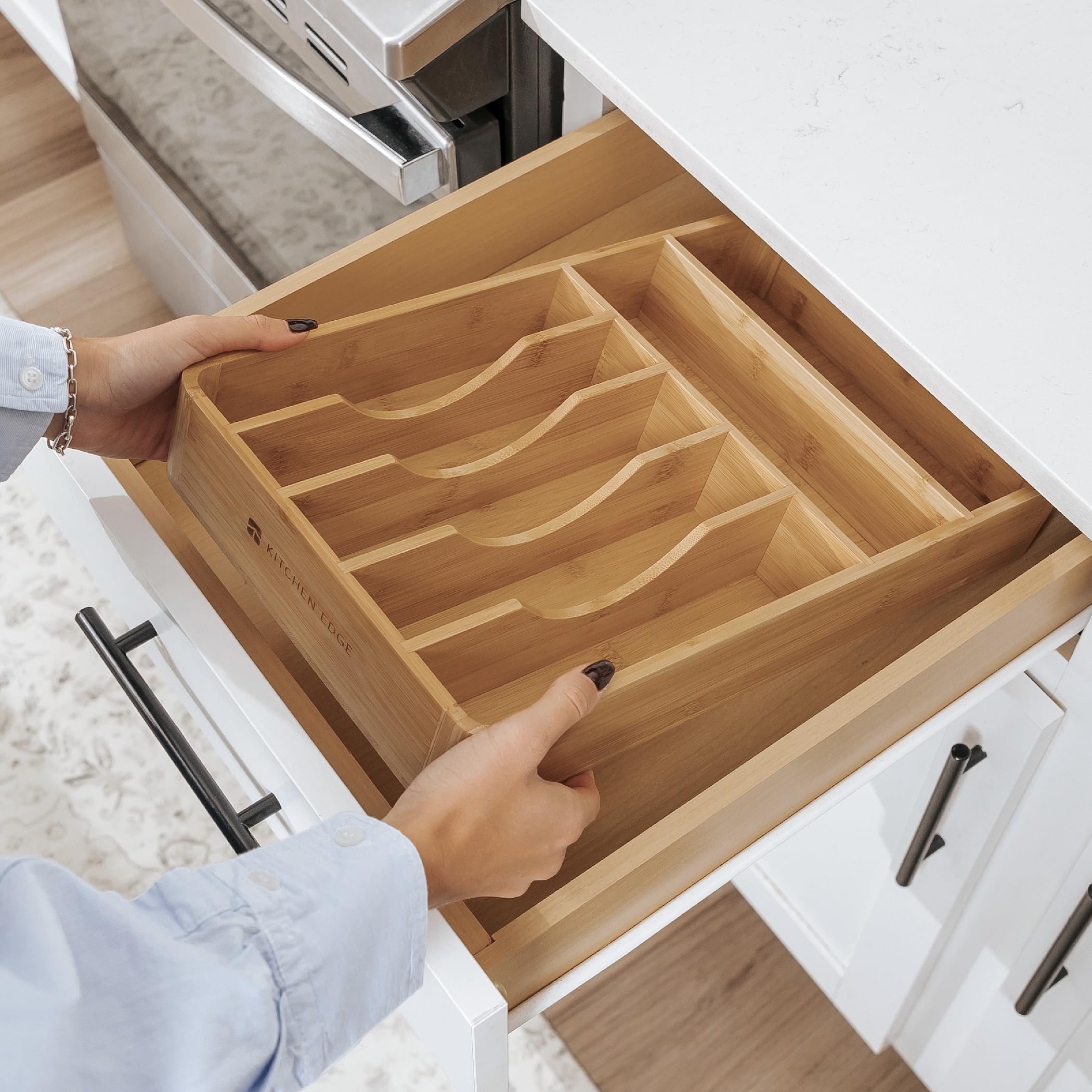 KitchenEdge holding serving utensils showing versatile storage benefit