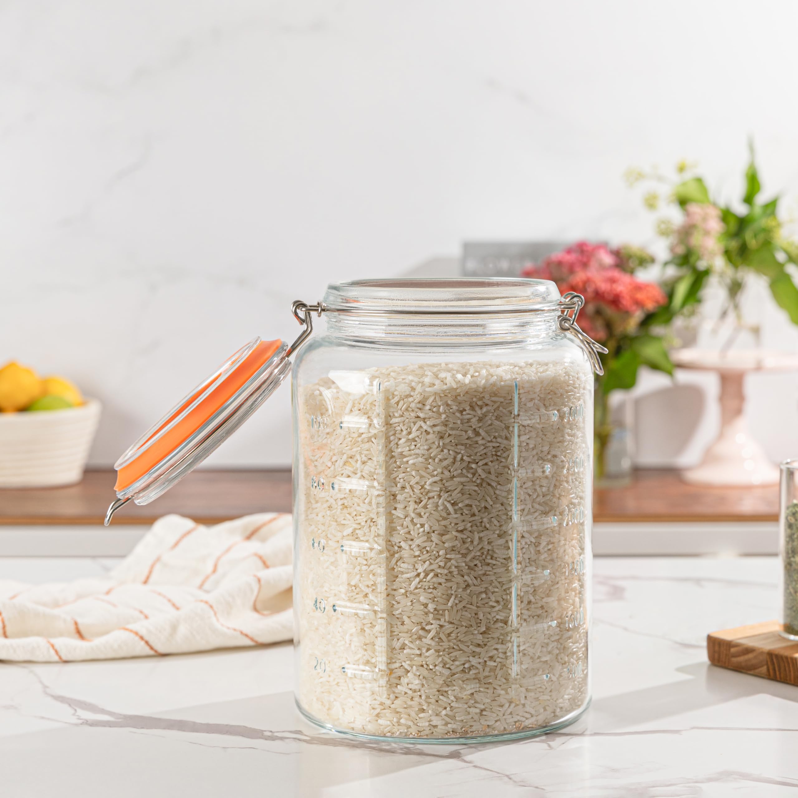 kitchentoolz jar beside utensils showing one-gallon size and scale