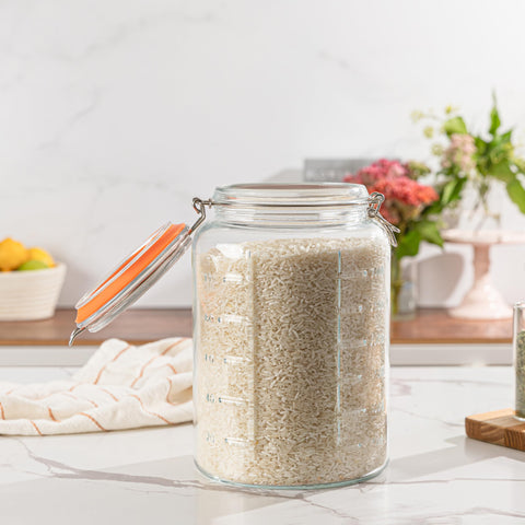 kitchentoolz jar beside utensils showing one-gallon size and scale
