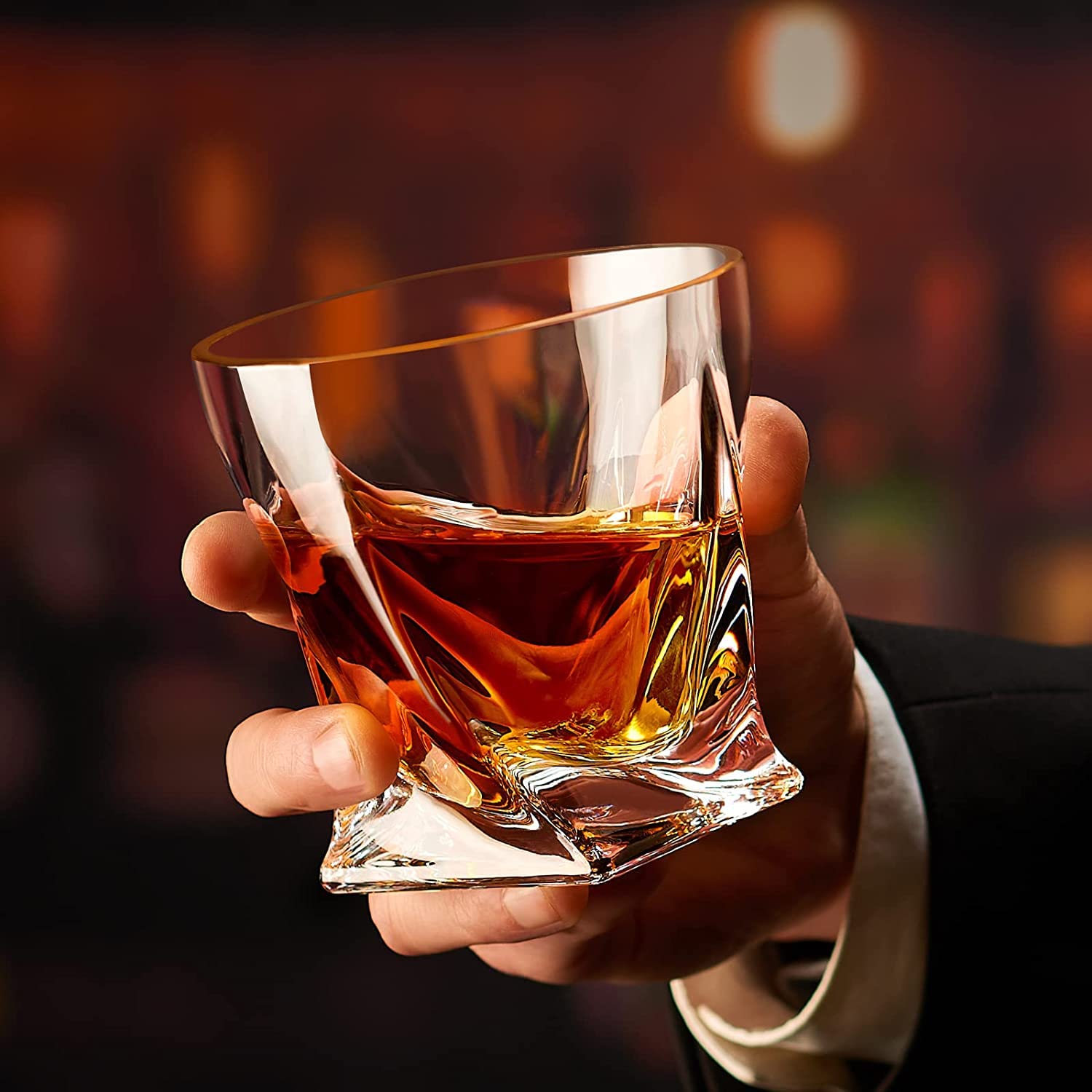 KITNATS glass held by hand showing 10 oz scale and ergonomic hold