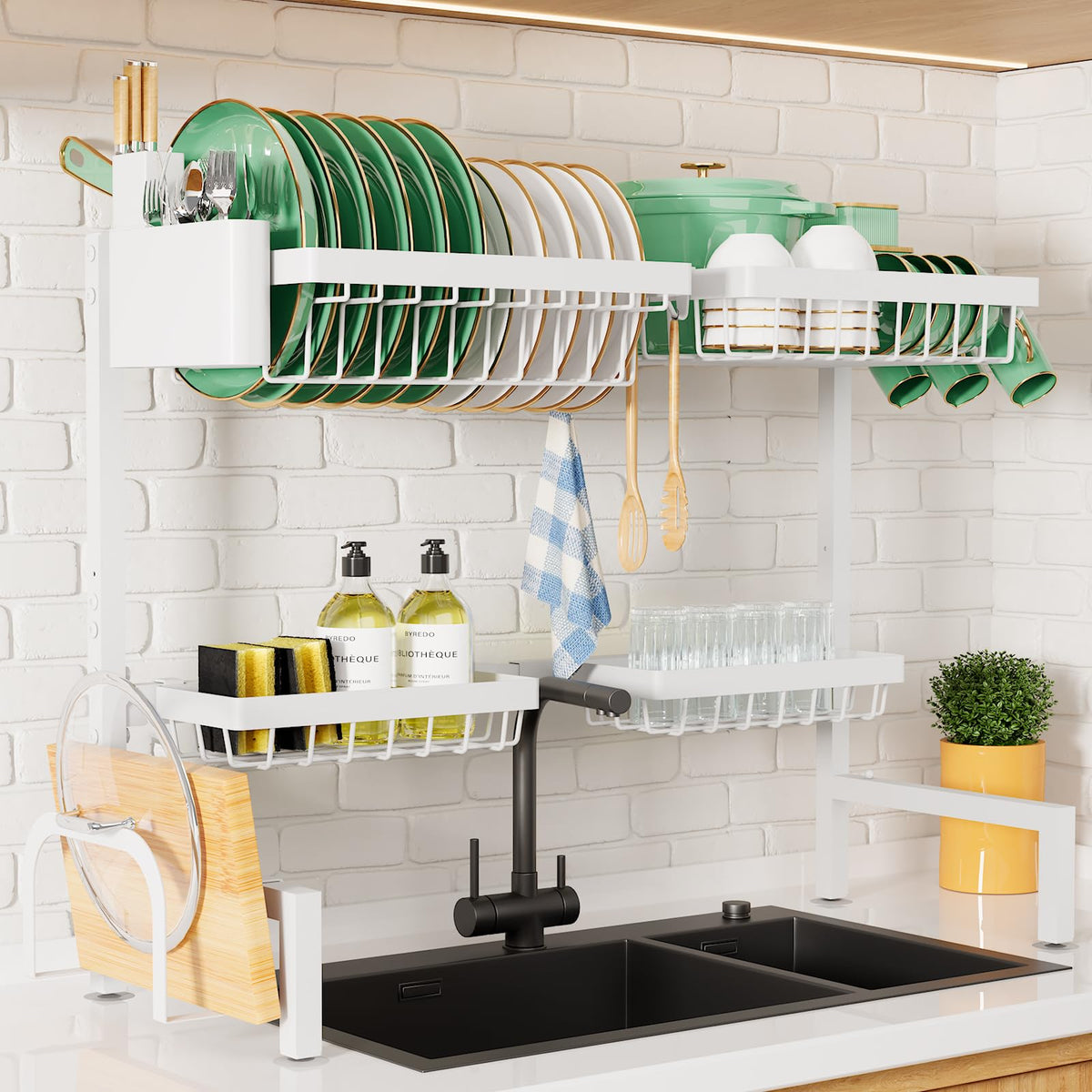 Kitsure over-the-sink rack front view showing organized dishes and dried countertop